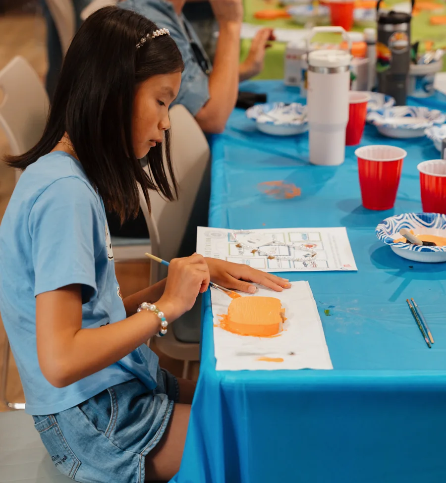 Lion’s Heart teen volunteer ready to support community nonprofit events. Photo by Nathan Palmer / OC Marketing Media